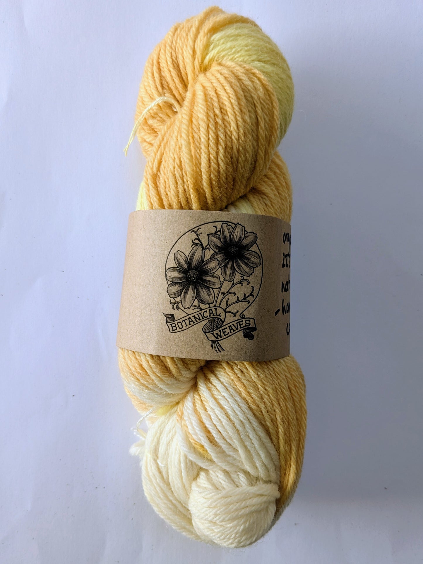 yarn: naturally dyed with weld & coreopsis flowers